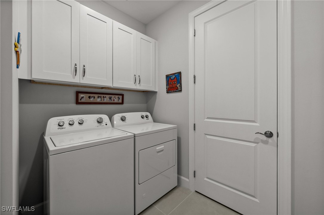 42243 Edgewater Drive Punta Gorda, FL 33982 - Photo 22 of 46 a utility room with dryer and washer