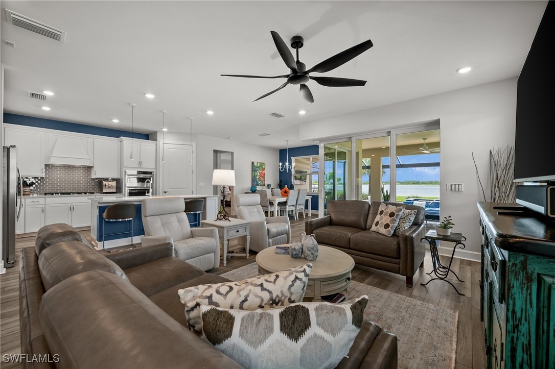 42243 Edgewater Drive Punta Gorda, FL 33982 - Photo 31 of 46 a living room with furniture and a view of kitchen