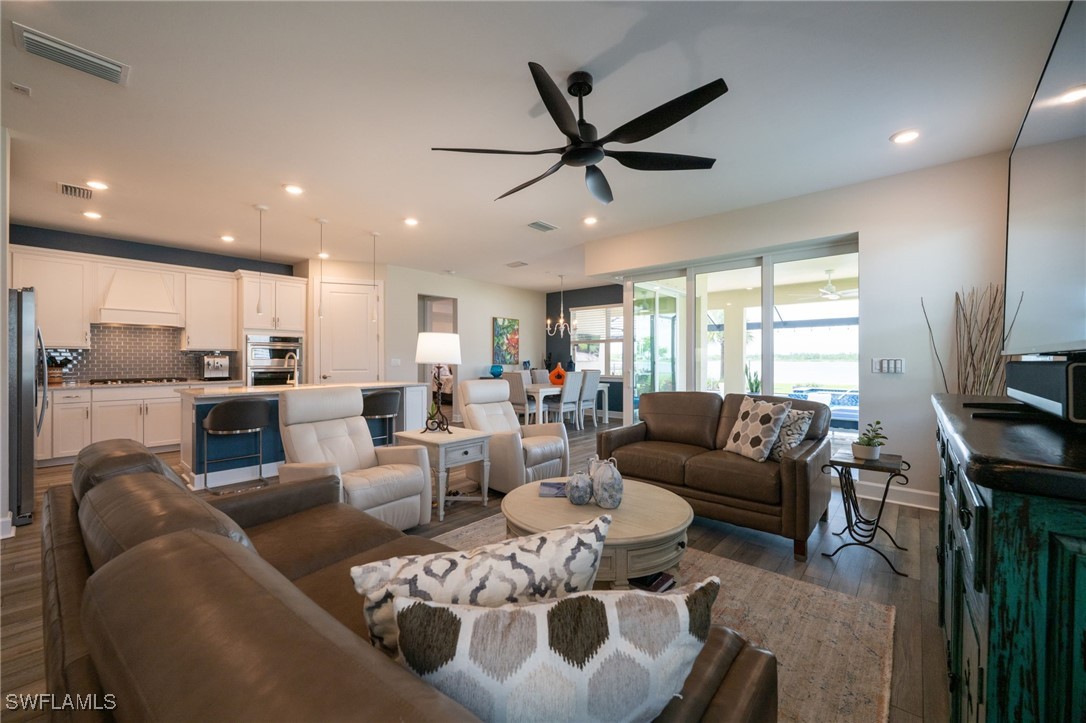 42243 Edgewater Drive Punta Gorda, FL 33982 - Photo 4 of 46 a living room with furniture and a window