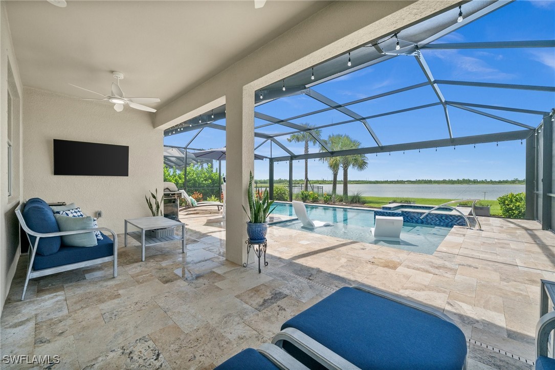 42243 Edgewater Drive Punta Gorda, FL 33982 - Photo 41 of 46 a bedroom with furniture and large windows