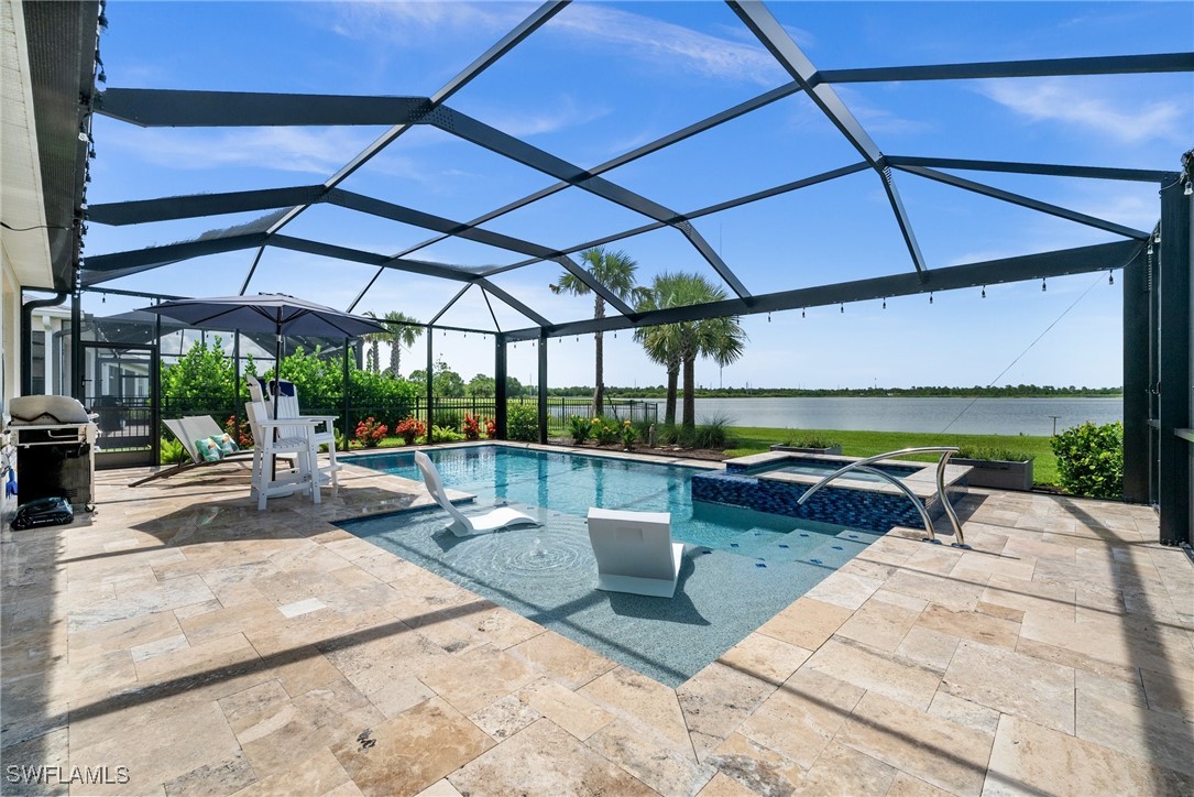42243 Edgewater Drive Punta Gorda, FL 33982 - Photo 42 of 46 a view of a swimming pool with a patio