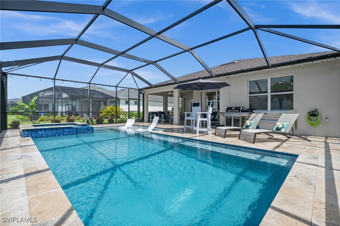 42243 Edgewater Drive Punta Gorda, FL 33982 - Photo 45 of 46 a view of a swimming pool with sitting area