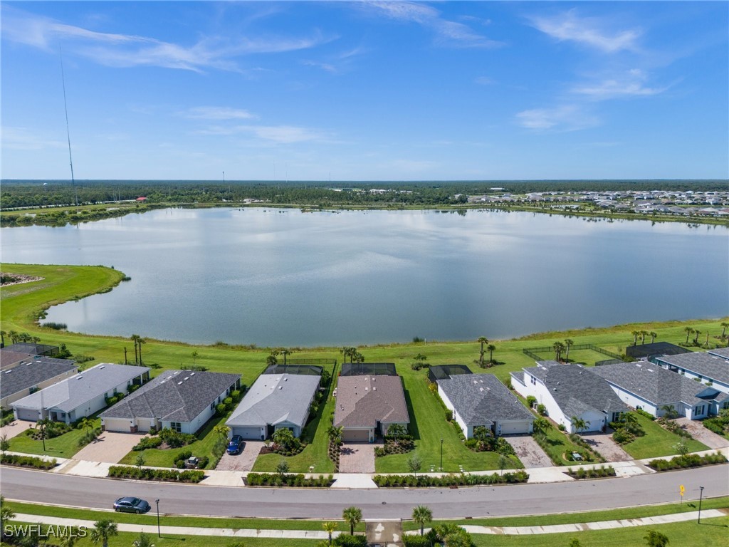 42243 Edgewater Drive Punta Gorda, FL 33982 - Photo 10 of 46 an aerial view of houses with outdoor space
