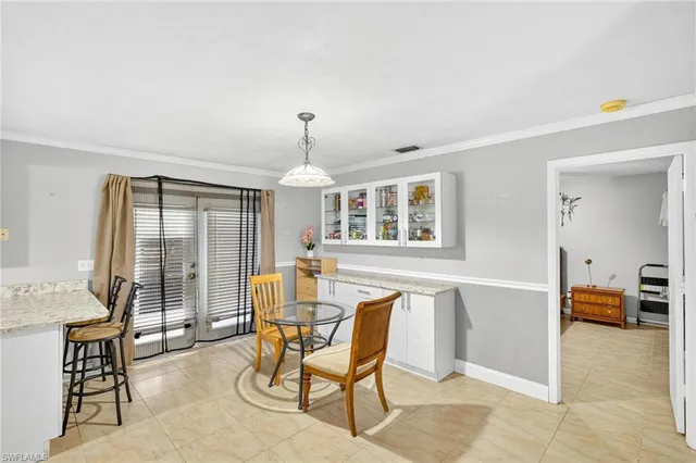 a view of a livingroom with furniture and windows