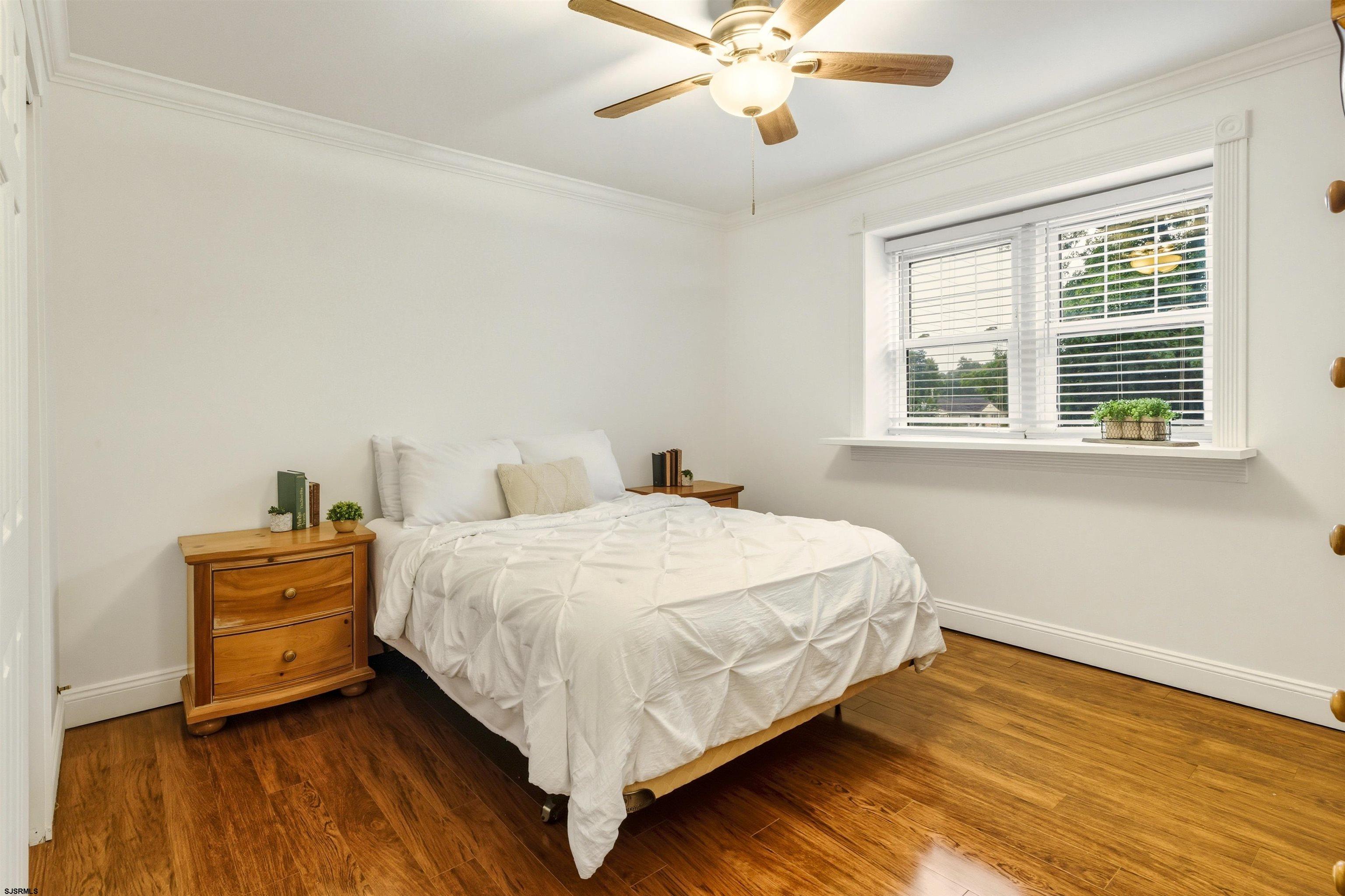 1100 Spring Lane Absecon, NJ 08201 - Photo 17 of 25 a bedroom with a bed and window