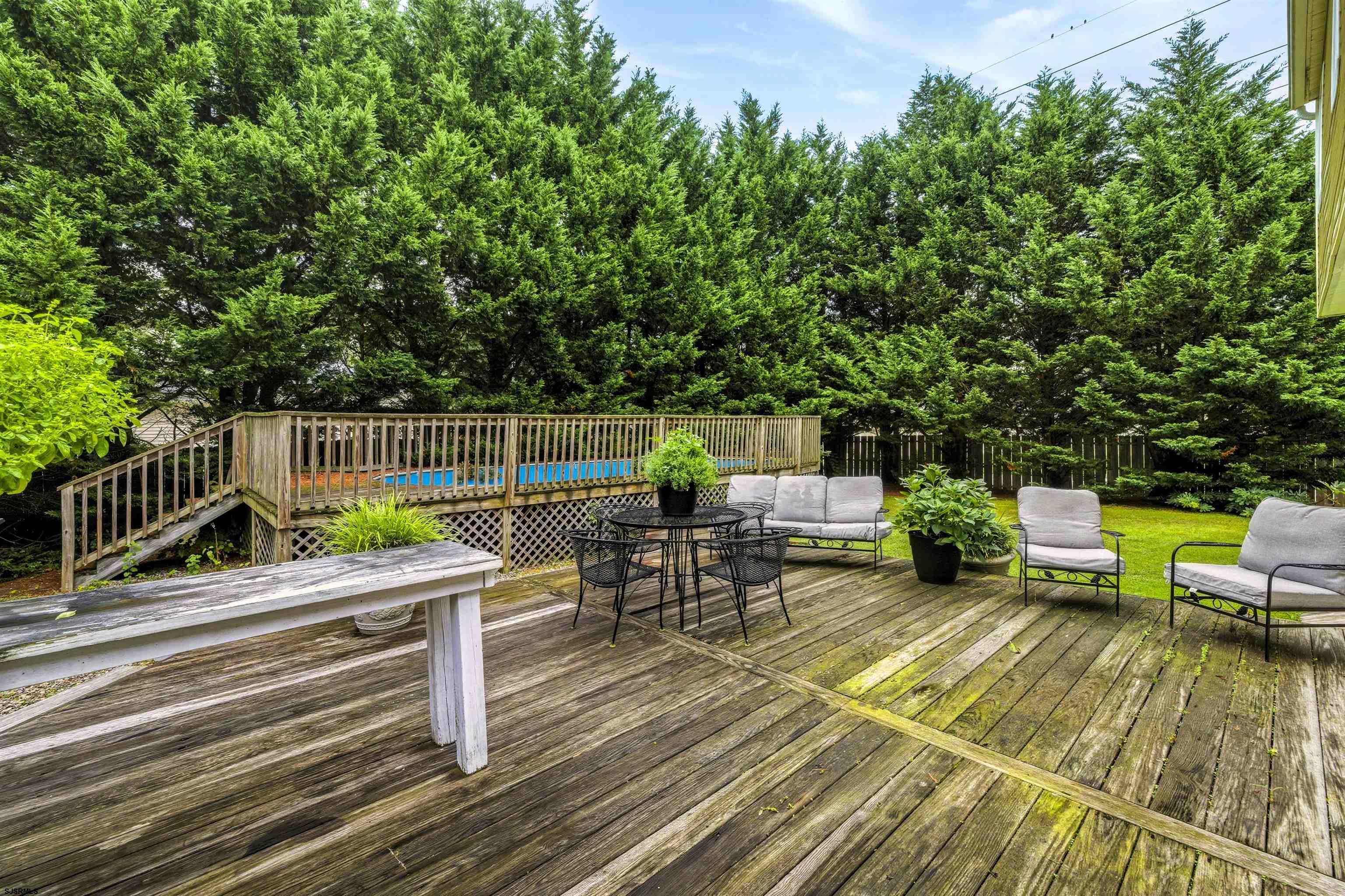 1100 Spring Lane Absecon, NJ 08201 - Photo 22 of 25 a view of a chairs and table in the patio