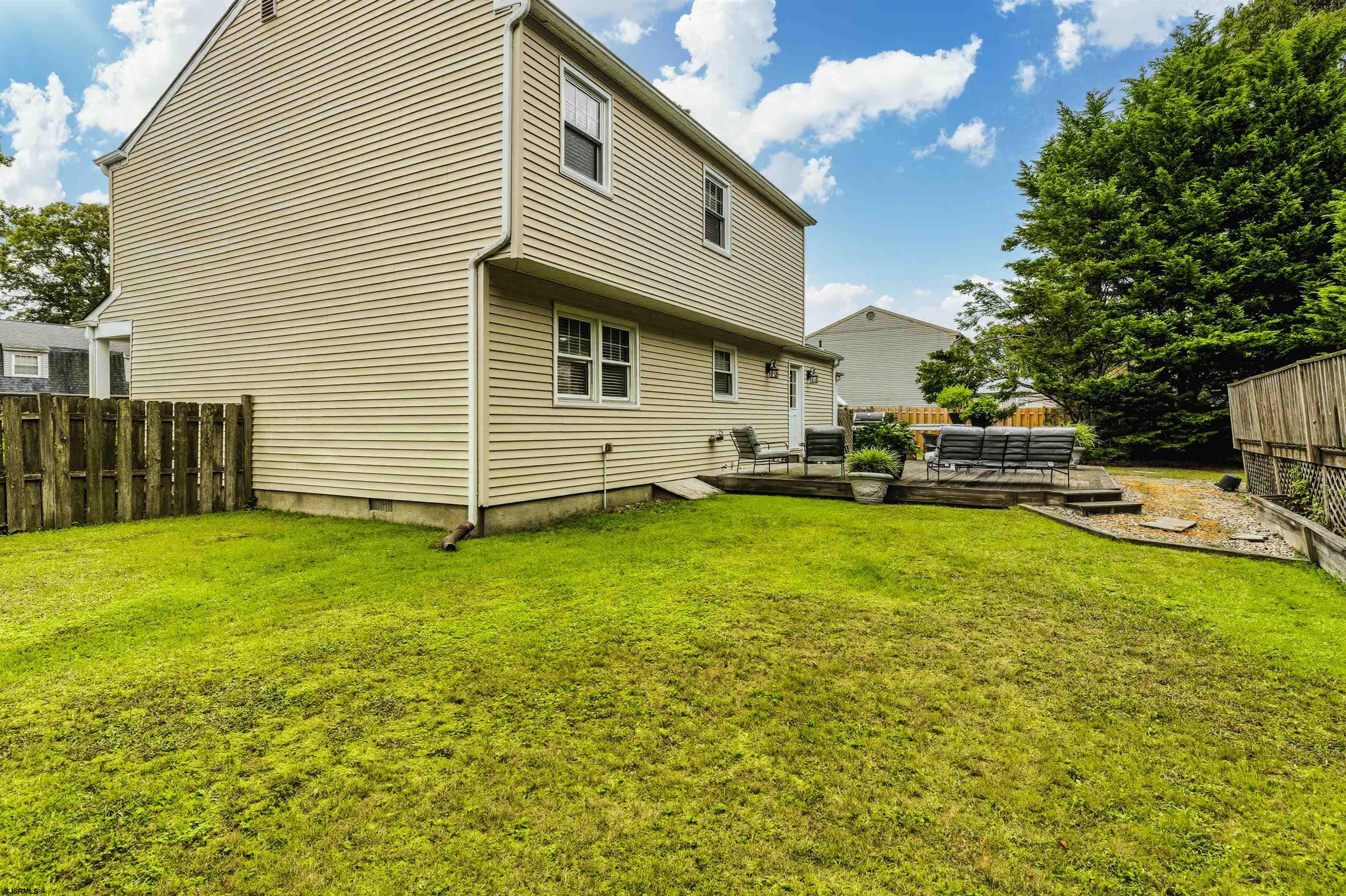 1100 Spring Lane Absecon, NJ 08201 - Photo 25 of 25 a view of a house with a yard