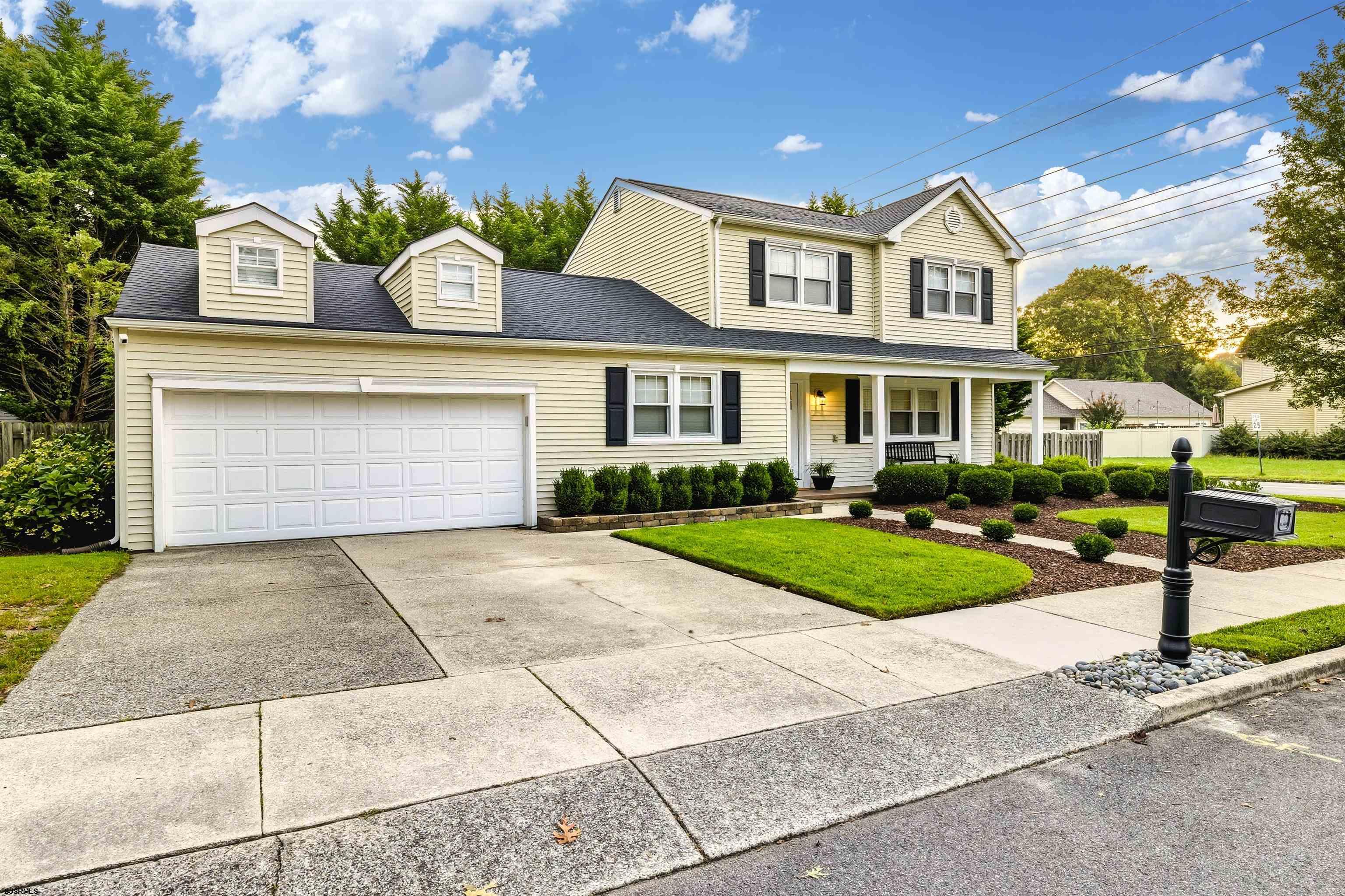 1100 Spring Lane Absecon, NJ 08201 - Photo 3 of 25 a front view of a house with garden