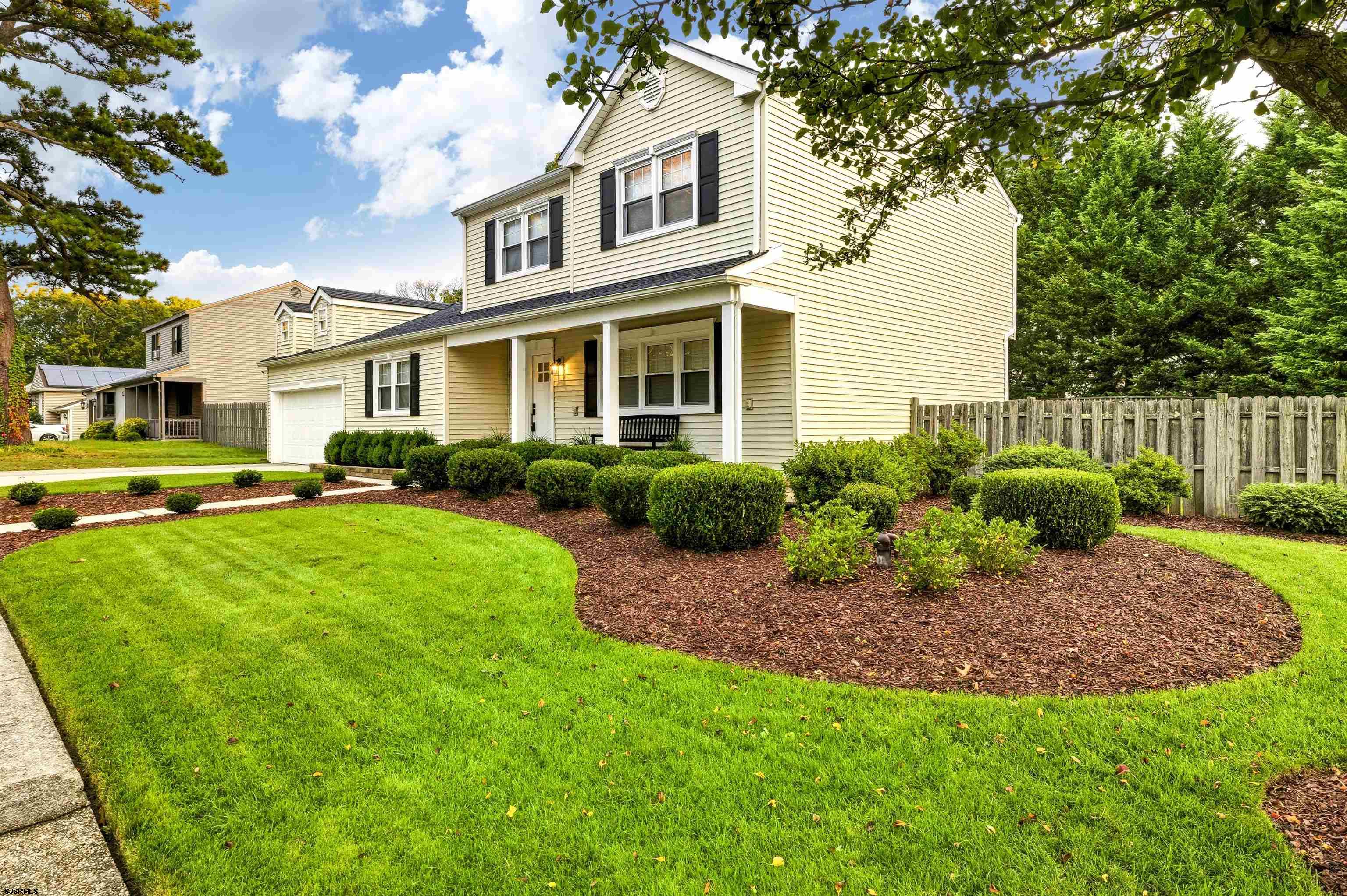 1100 Spring Lane Absecon, NJ 08201 - Photo 4 of 25 a view of a yard in front of a house