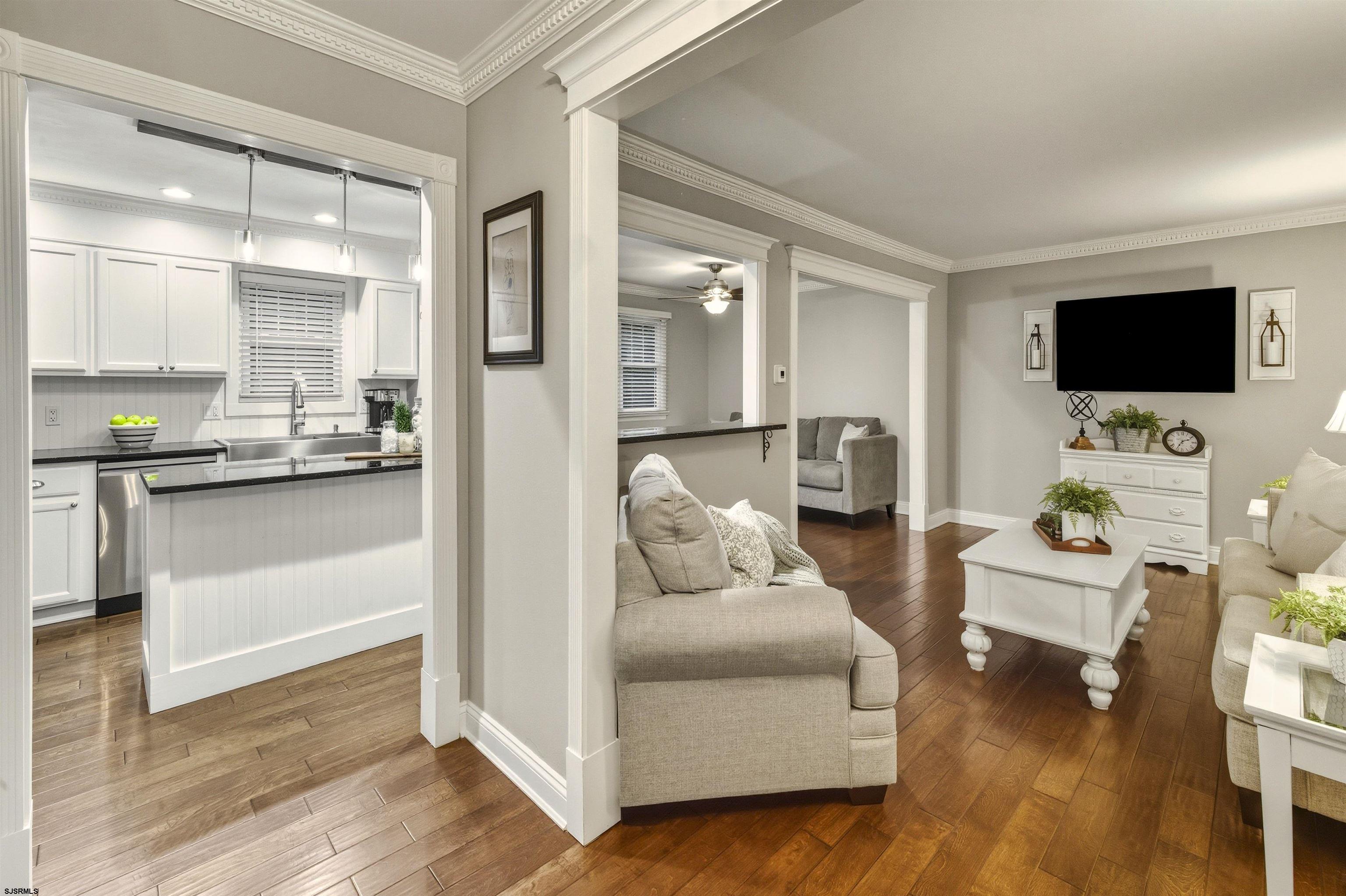1100 Spring Lane Absecon, NJ 08201 - Photo 5 of 25 a living room with furniture and a flat screen tv