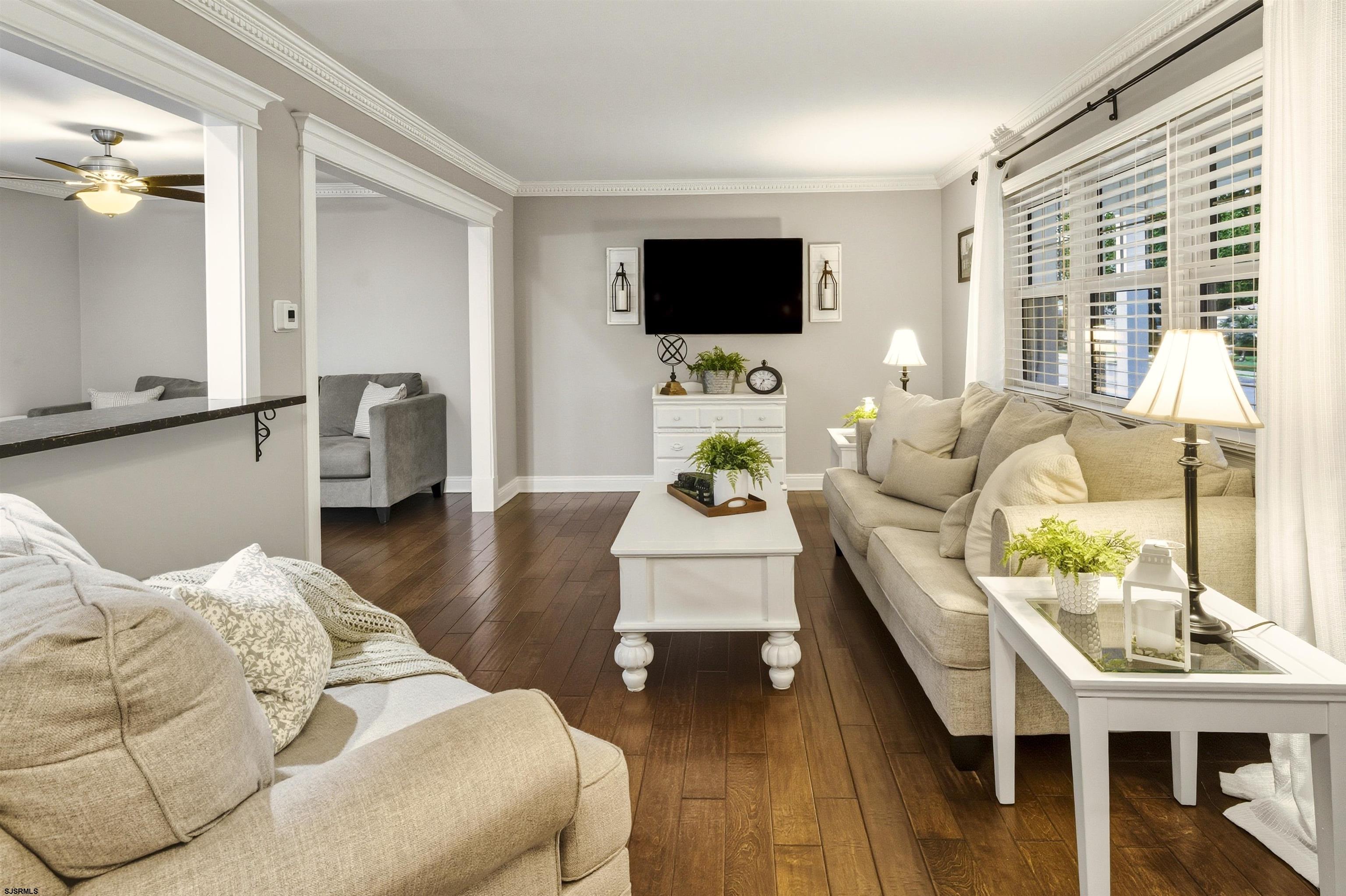 1100 Spring Lane Absecon, NJ 08201 - Photo 6 of 25 a living room with furniture and a flat screen tv