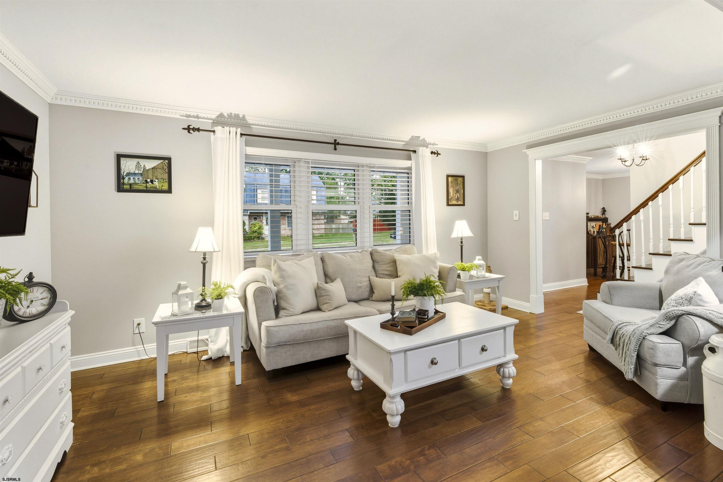 1100 Spring Lane Absecon, NJ 08201 - Photo 9 of 25 a living room with furniture and a large window
