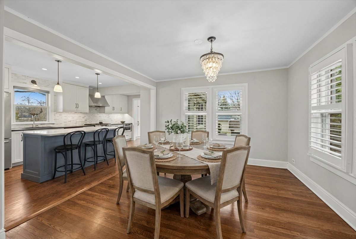 347 Keystone Avenue River Forest, IL 60305 - Photo 15 of 36 a view of a dining room with furniture window and wooden floor