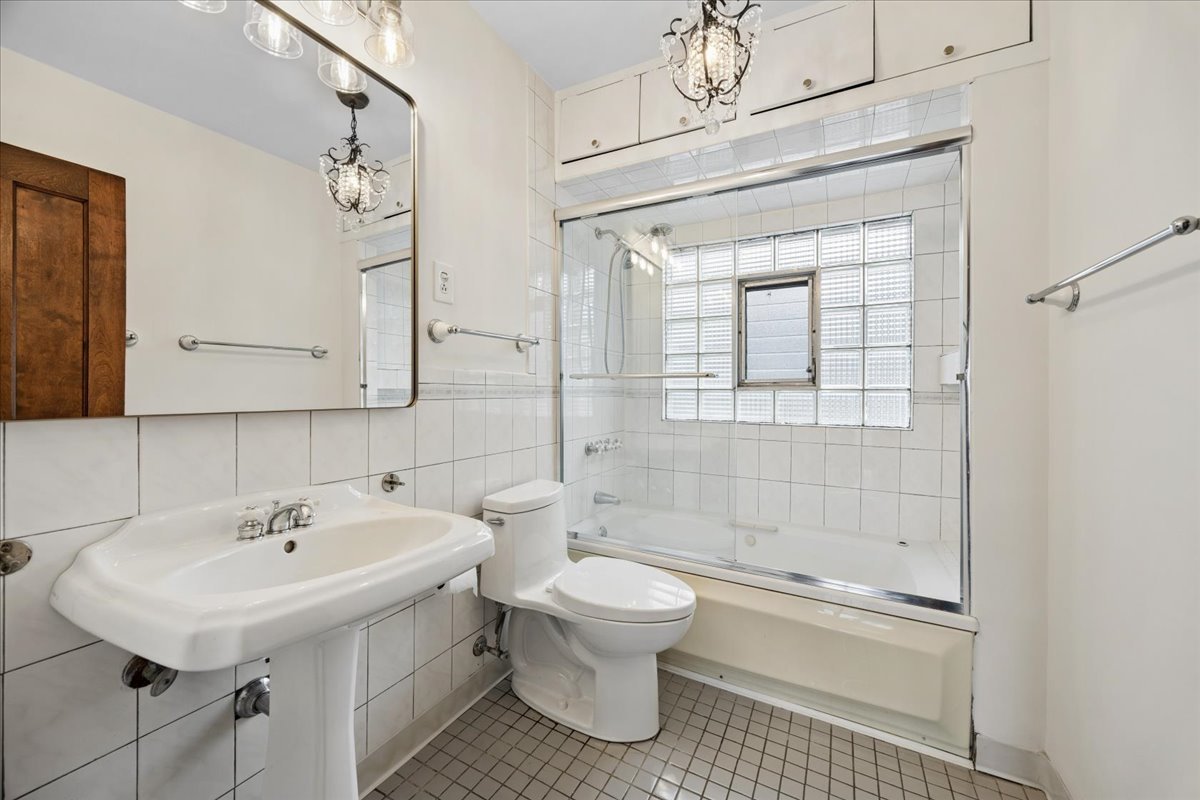 347 Keystone Avenue River Forest, IL 60305 - Photo 25 of 36 a bathroom with a sink a toilet and shower