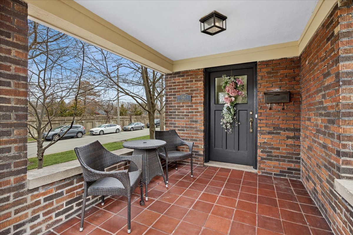 347 Keystone Avenue River Forest, IL 60305 - Photo 3 of 36 a view of a porch with chairs and a yard