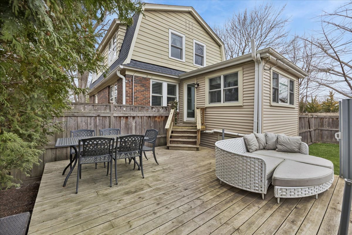 347 Keystone Avenue River Forest, IL 60305 - Photo 32 of 36 a view of a patio with couches table and chairs and wooden floor