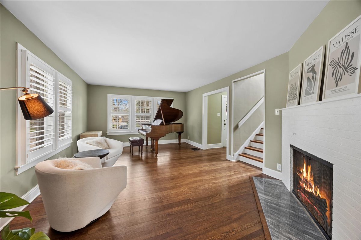 347 Keystone Avenue River Forest, IL 60305 - Photo 4 of 36 a living room with furniture and a fireplace