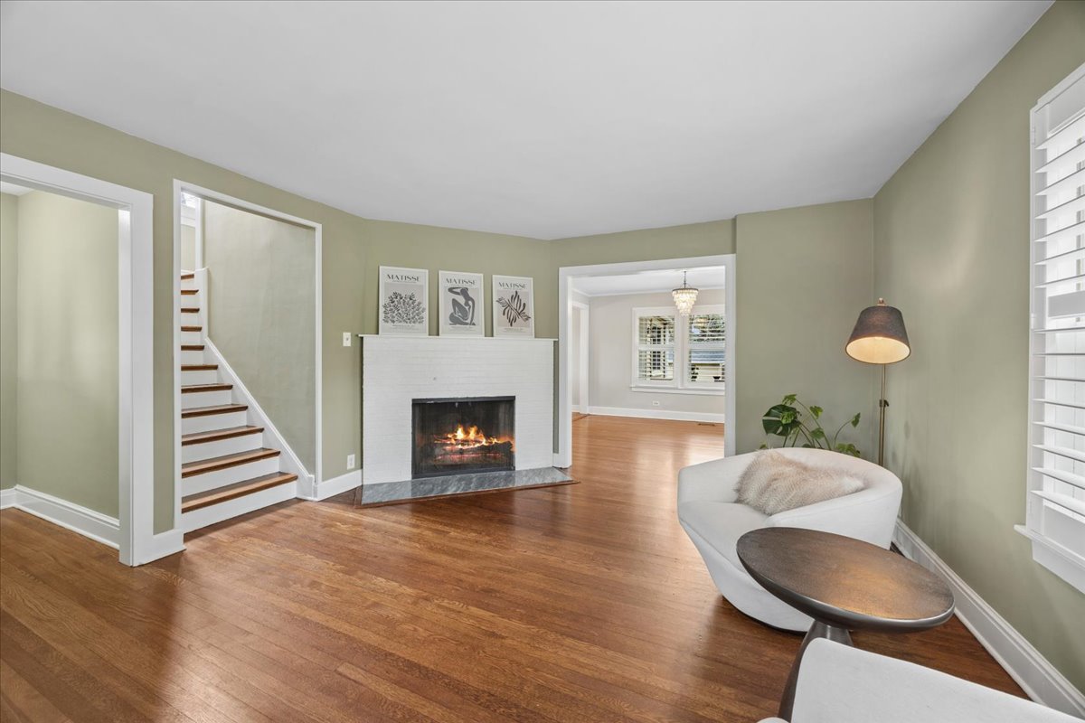 347 Keystone Avenue River Forest, IL 60305 - Photo 5 of 36 a living room with furniture and a fireplace