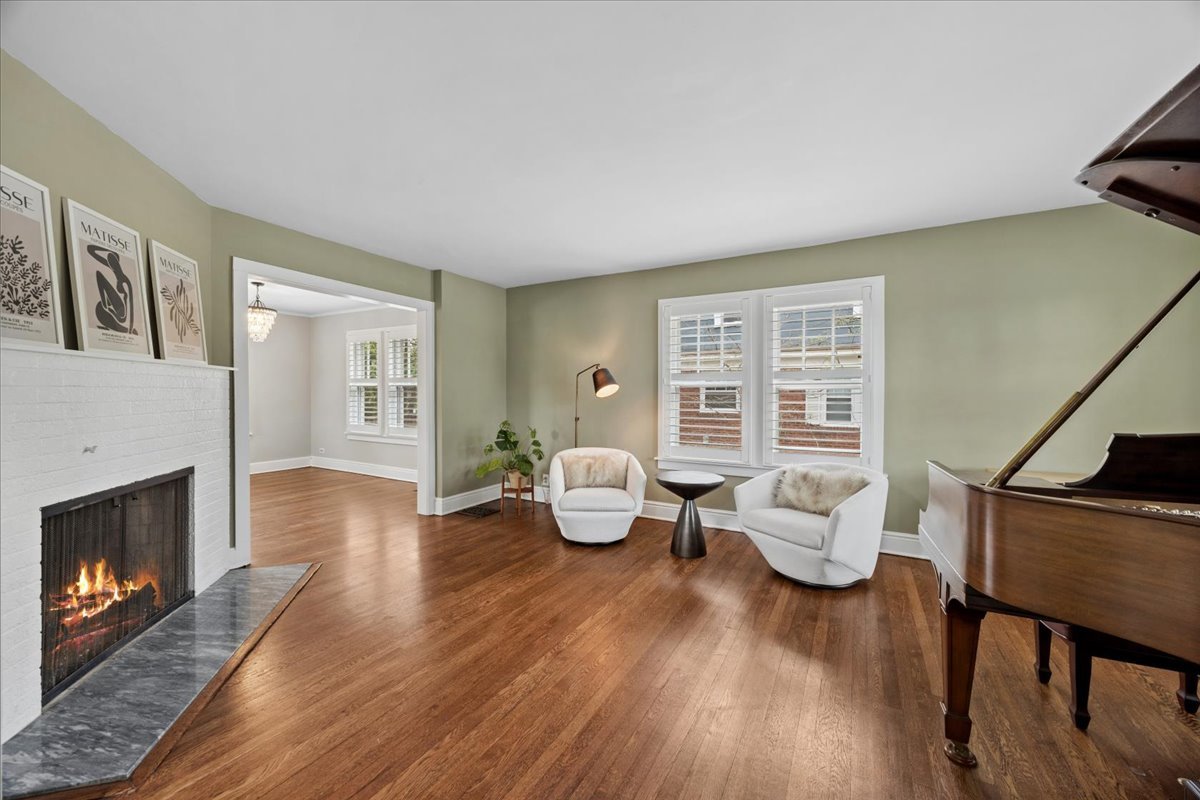 347 Keystone Avenue River Forest, IL 60305 - Photo 6 of 36 a living room with furniture and a fireplace
