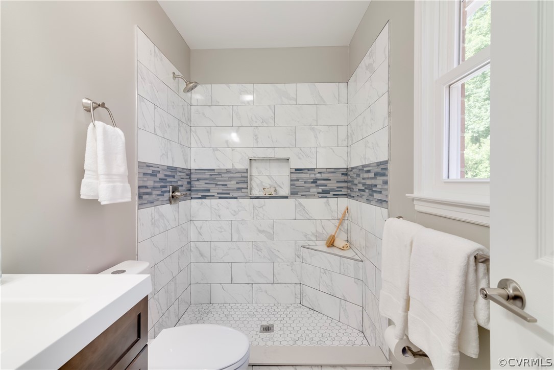 10201 Ridgerun Road Chesterfield, VA 23832 - Photo 23 of 37 a bathroom with a sink toilet and shower