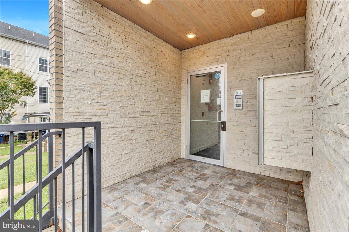 1416 22nd Street Southeast, Unit 9 Washington, DC 20020 - Photo 31 of 31 a view of entryway with wooden floor