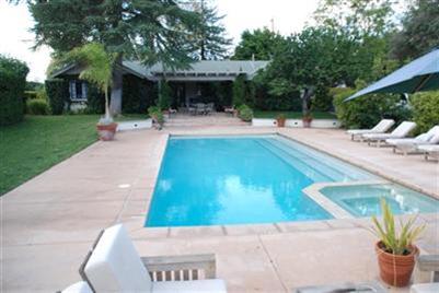 804 South Rice Road Ojai, CA 93023 - Photo 1 of 10 a swimming pool with outdoor seating and yard