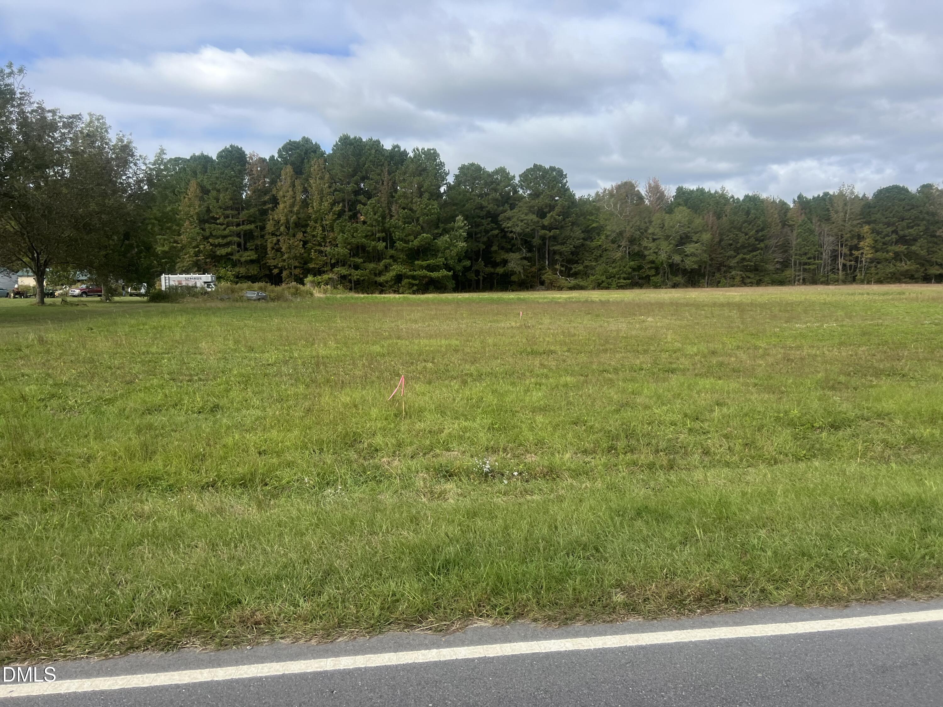 478 Indian Camp Road Smithfield, NC 27577 - Photo 2 of 15 a view of a field with a yard