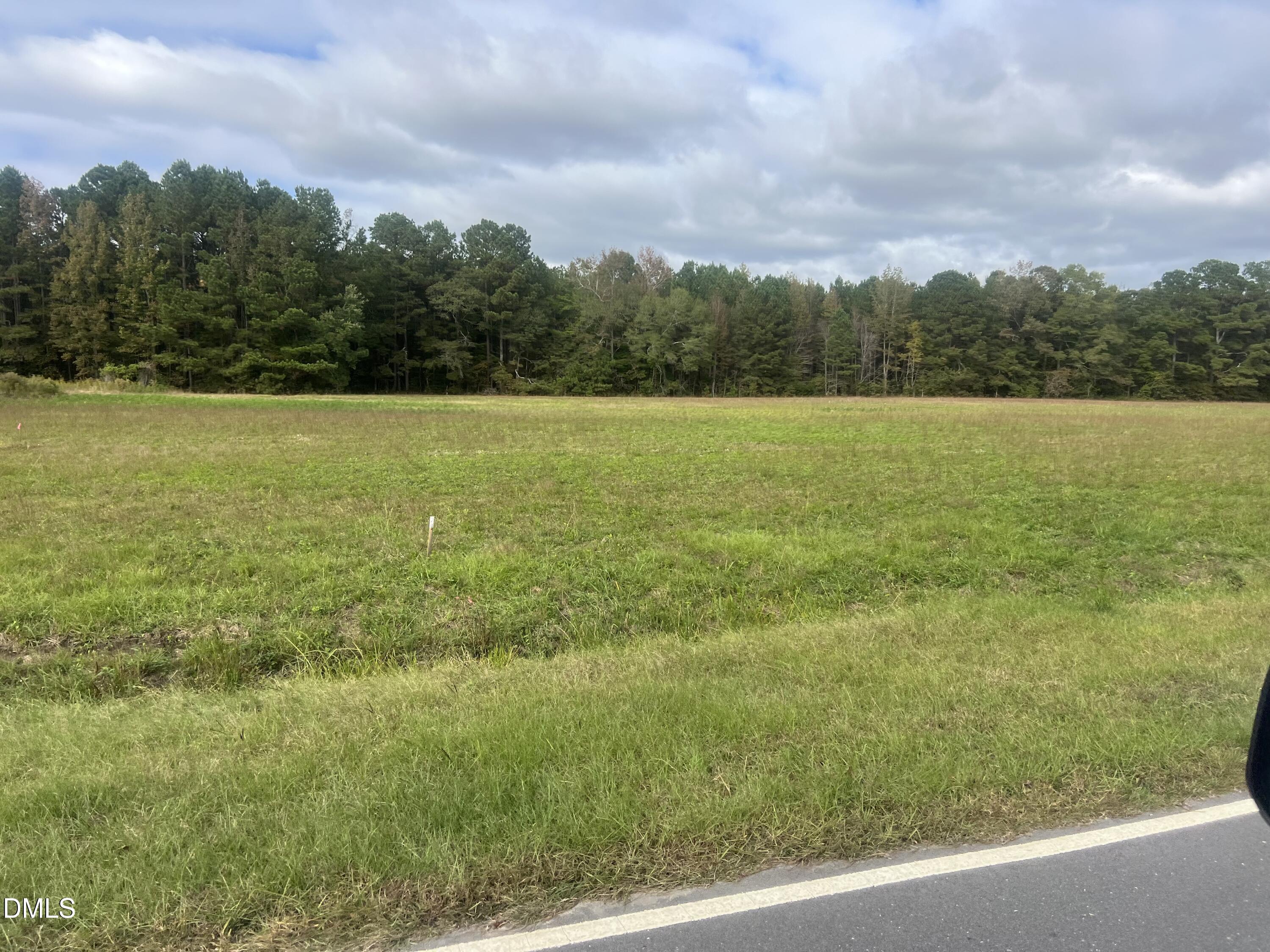 478 Indian Camp Road Smithfield, NC 27577 - Photo 3 of 15 a view of a field with an ocean