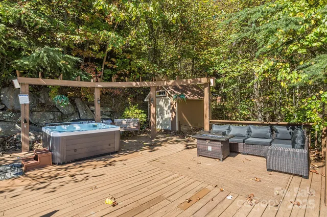 a view of roof deck with patio