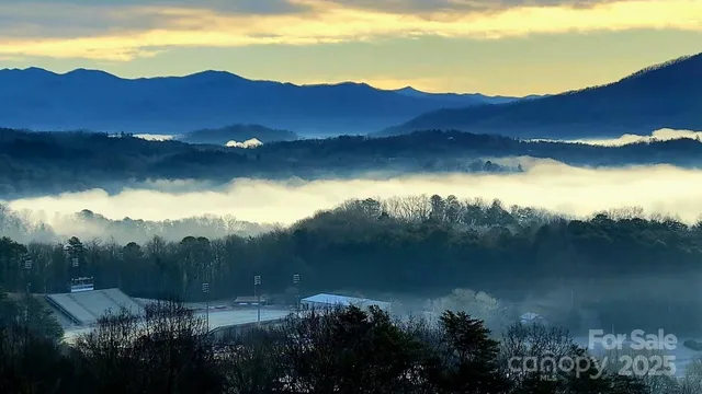 a view of lake and mountain