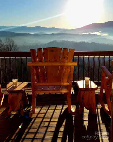 a view of a balcony with chairs