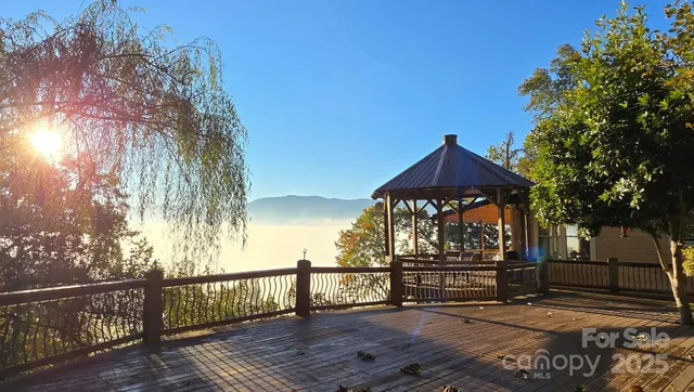 a view of a brick house with a large window