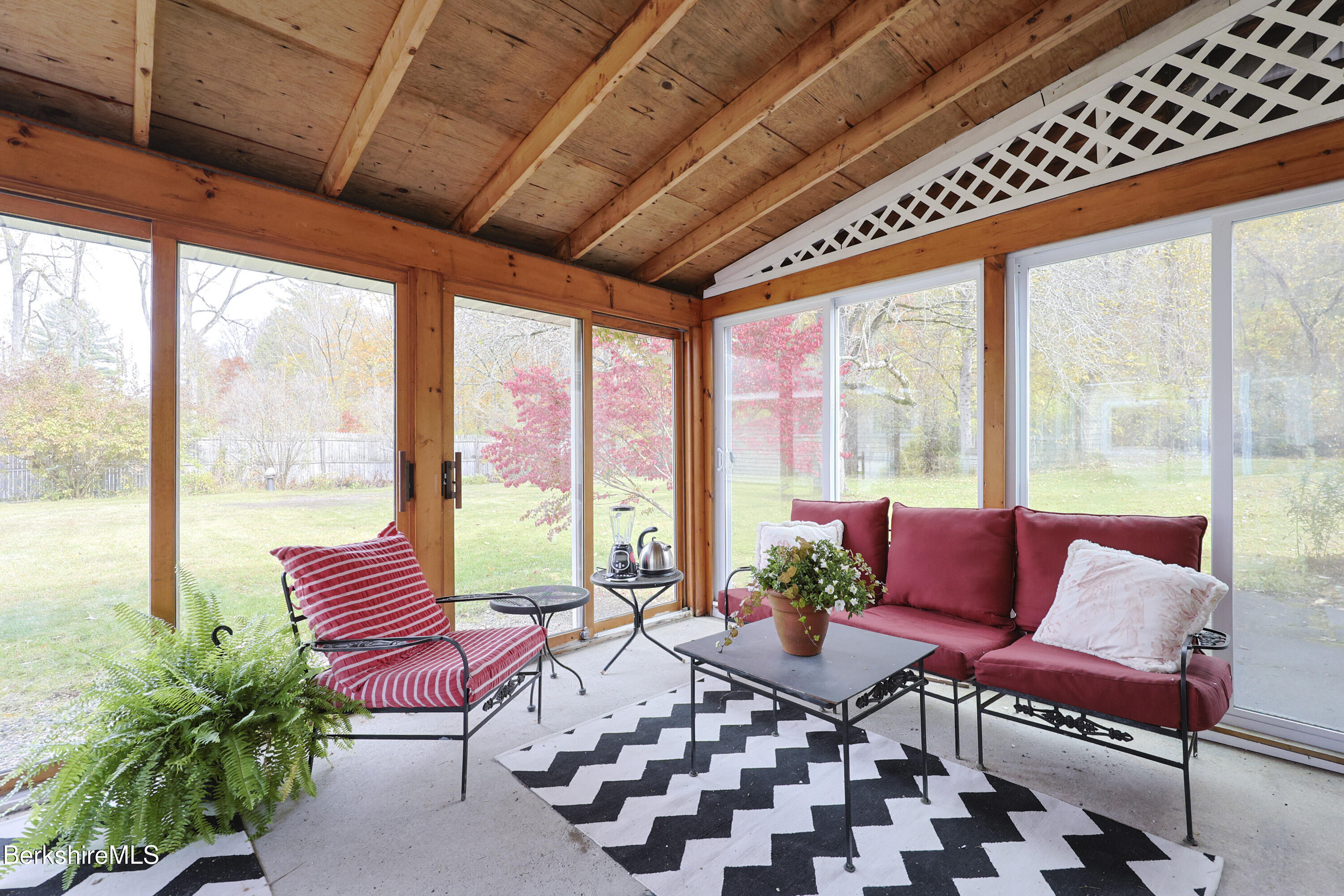 16 East New Lenox Road Lenox, MA 01240 - Photo 7 of 31 a living room with furniture and a large window