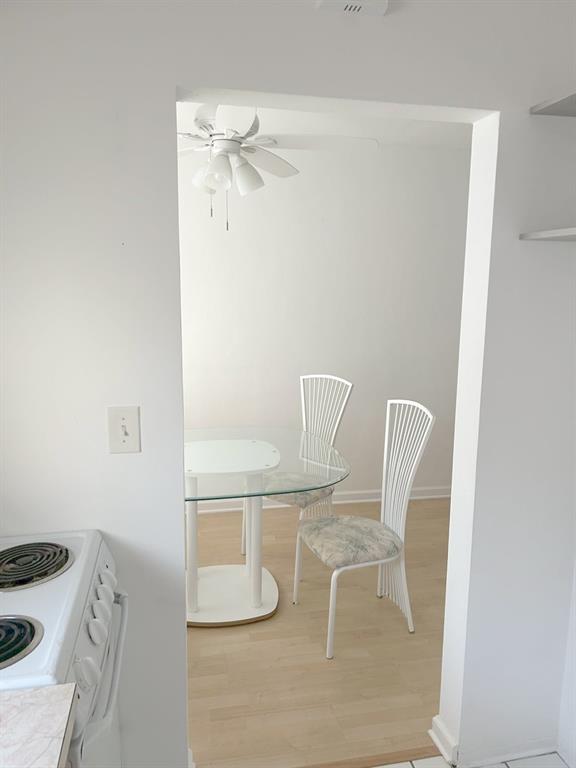 77 Hendricks Isle, Unit 9 Fort Lauderdale, FL 33301 - Photo 15 of 21 a view of a room with table and chairs