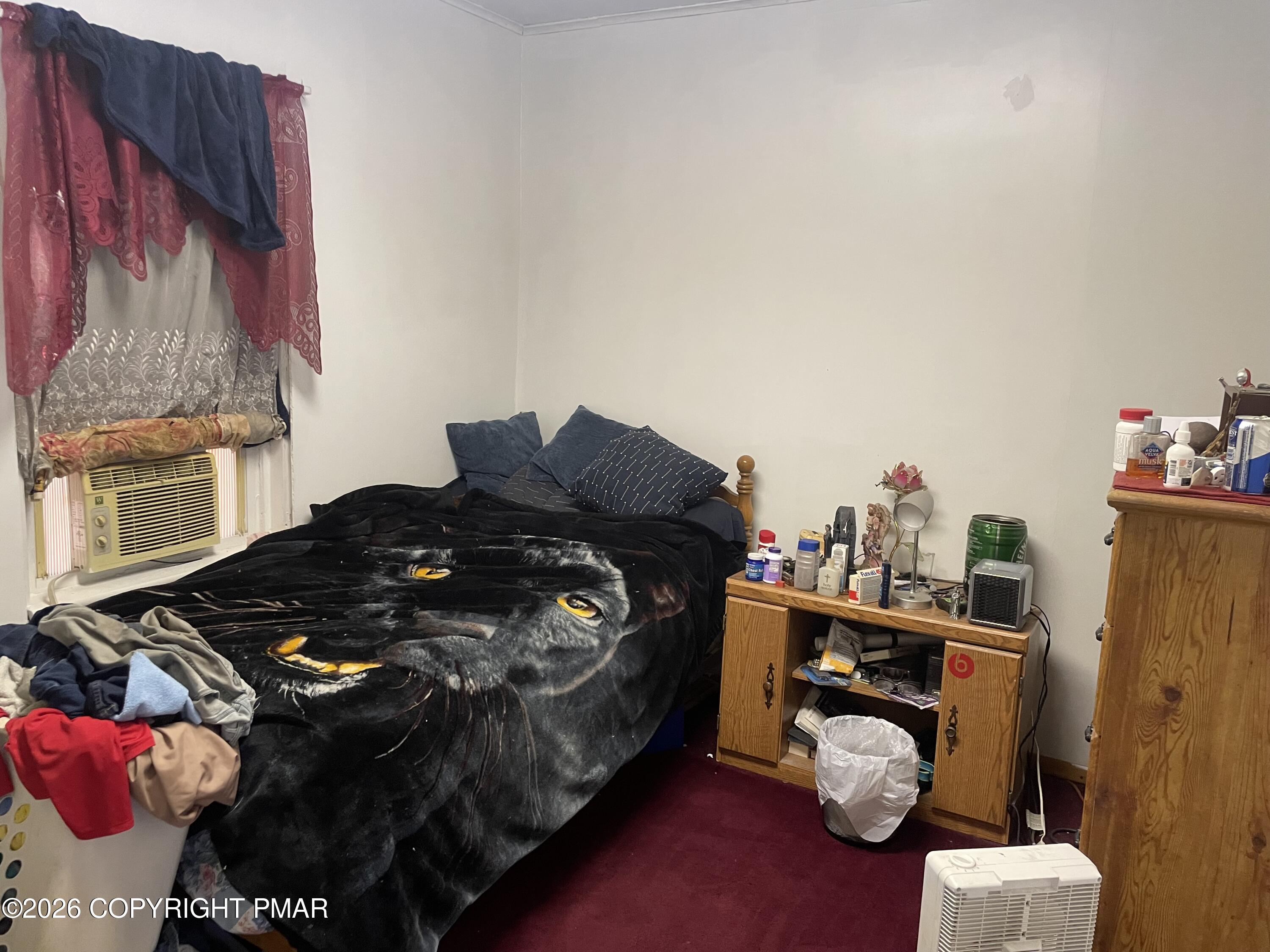 1055 Main Road Lehighton, PA 18235 - Photo 17 of 22 a bedroom with a bed and a dresser