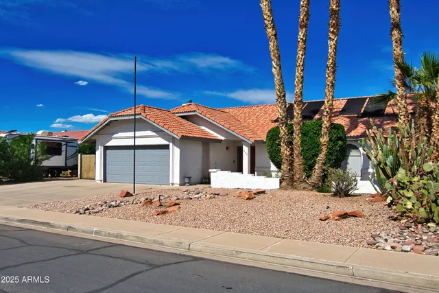 a view of a house with a big yard