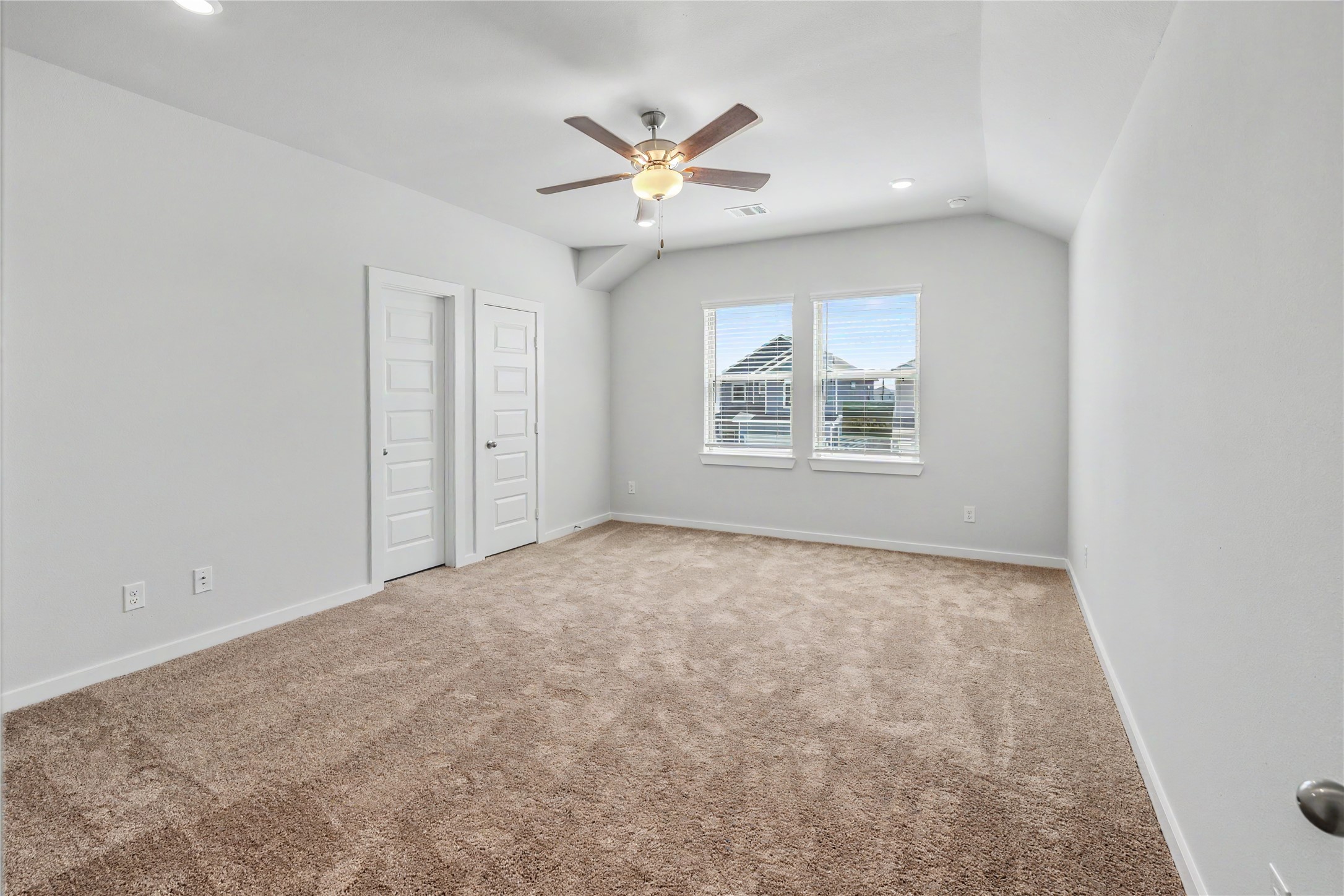 6426 Bolinas Court Rosharon, TX 77583 - Photo 41 of 49 an empty room with windows and ceiling fan