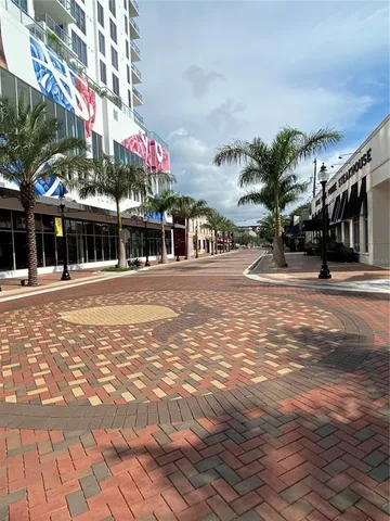 a view of street with stores