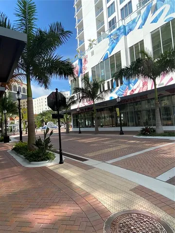 a view of a building with a tree