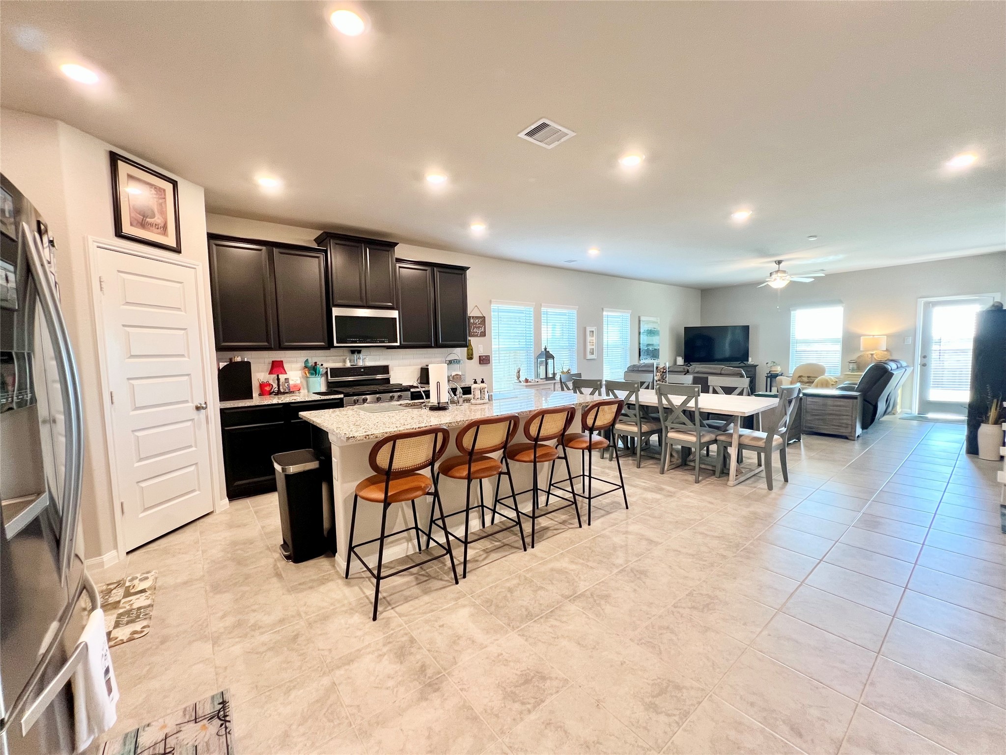 10013 Hermann Trace Texas City, TX 77591 - Photo 4 of 22 a view of a dining room with furniture