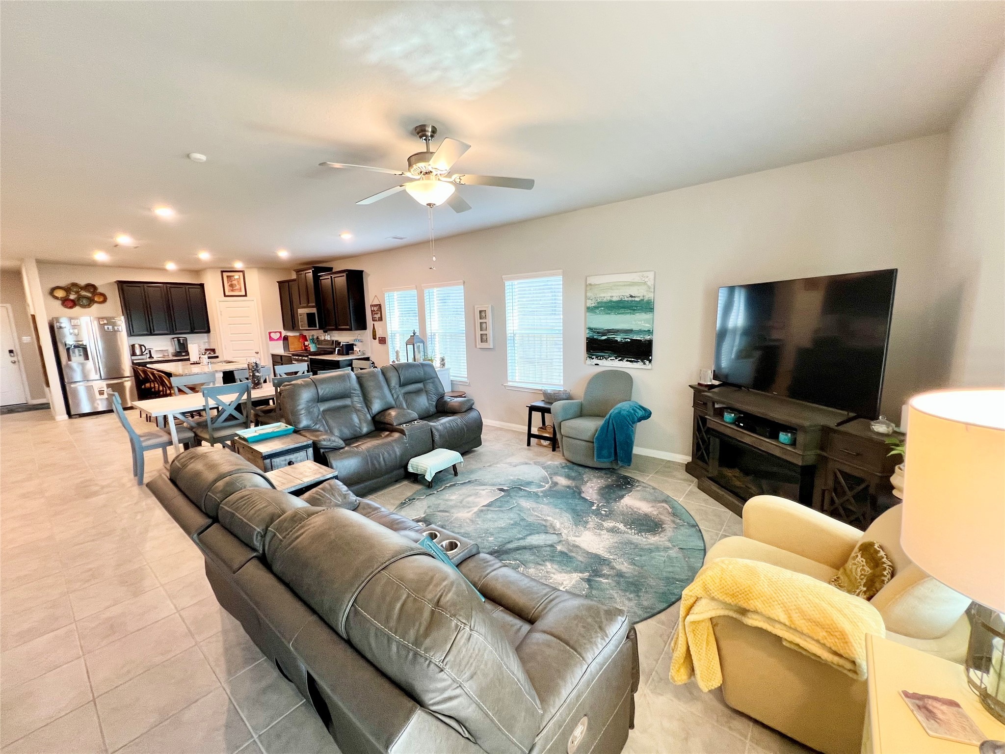 10013 Hermann Trace Texas City, TX 77591 - Photo 9 of 22 a living room with furniture and a flat screen tv