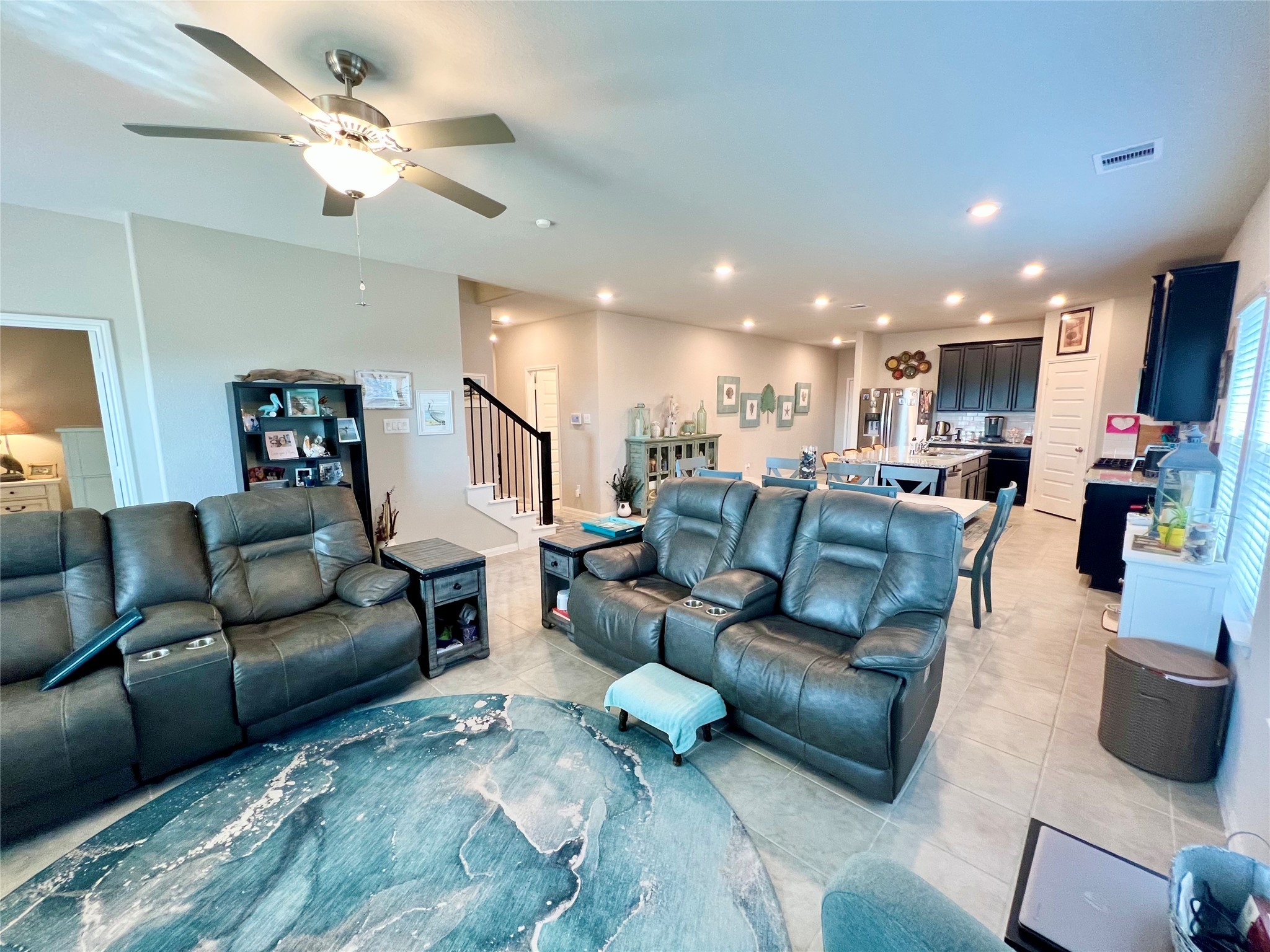 10013 Hermann Trace Texas City, TX 77591 - Photo 10 of 22 a living room with furniture and a view of kitchen