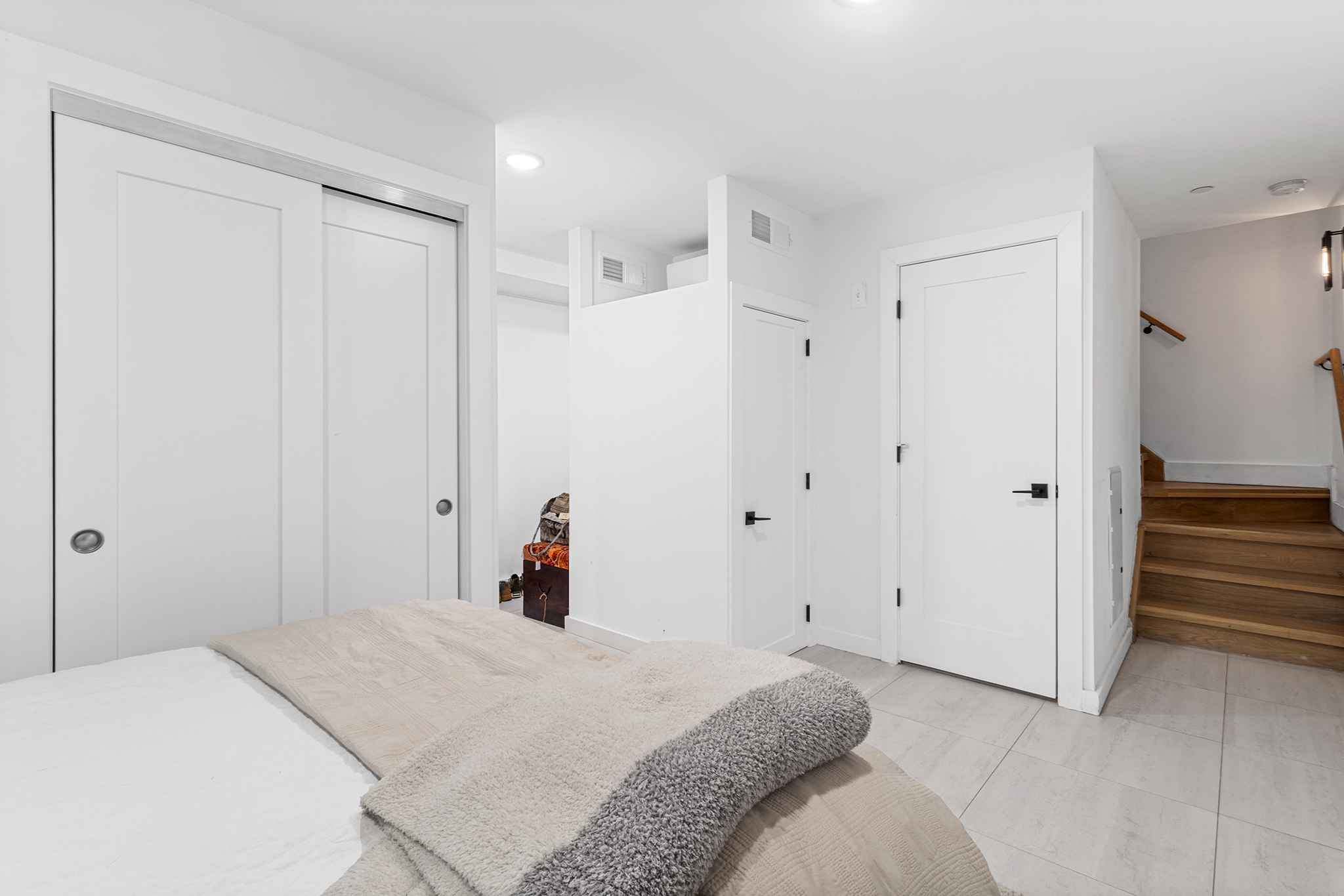 31 Bleecker Street, Unit 1R Brooklyn, NY 11221 - Photo 14 of 19 a bedroom with a bed and a shower