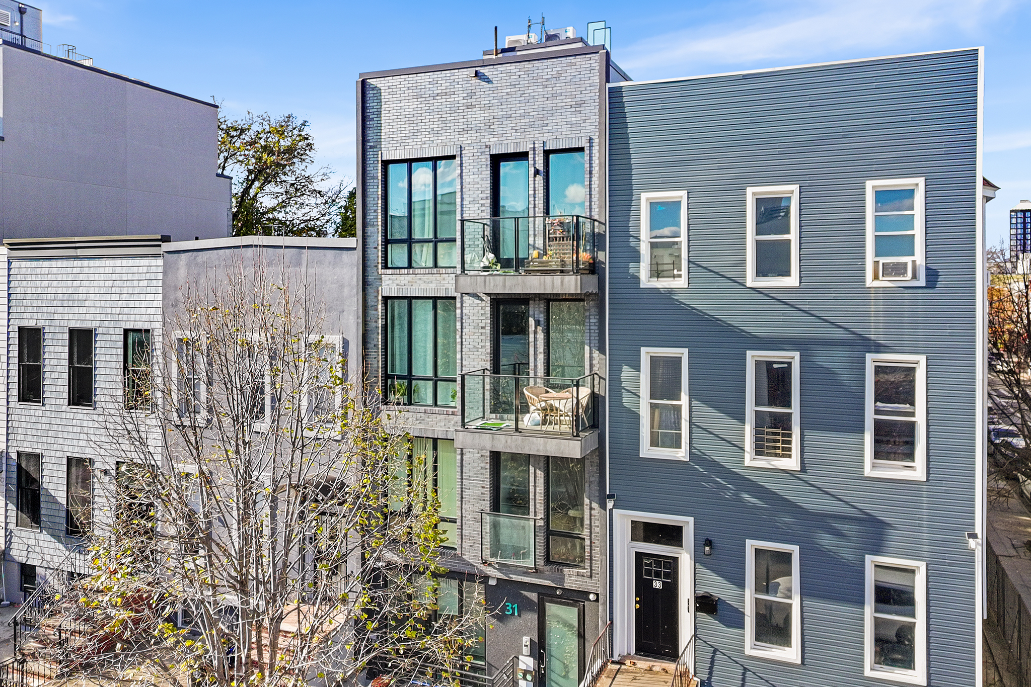 31 Bleecker Street, Unit 1R Brooklyn, NY 11221 - Photo 4 of 19 a front view of a building with a garden