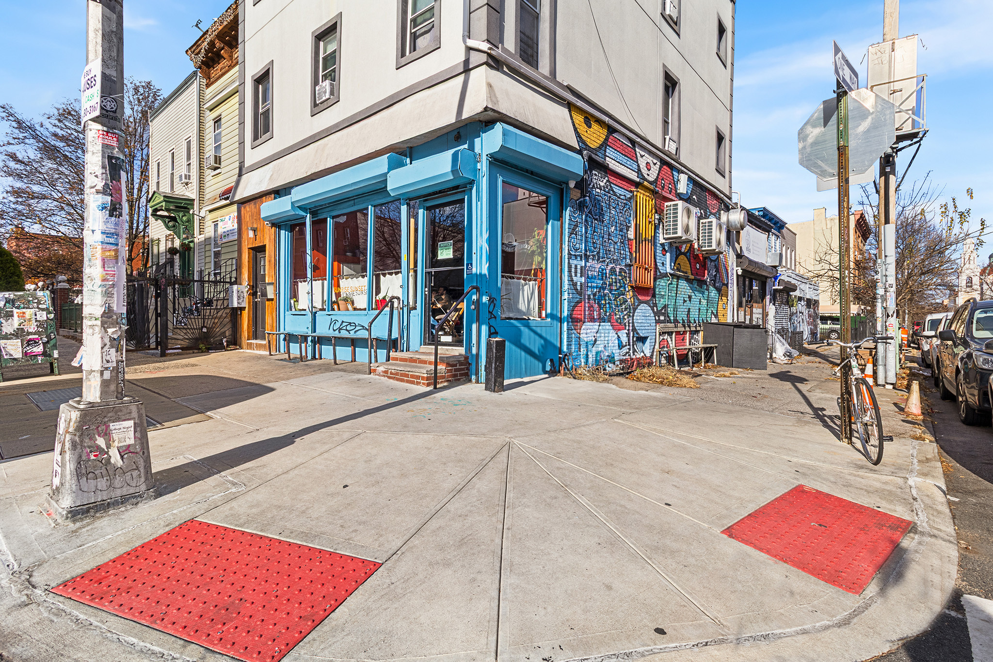 31 Bleecker Street, Unit 1R Brooklyn, NY 11221 - Photo 7 of 19 front view of a building with a umbrellas