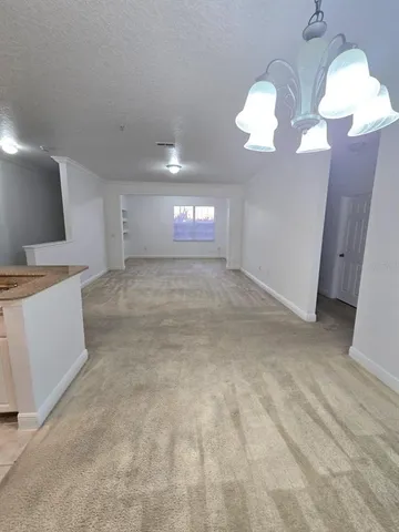 a view of a livingroom with a chandelier