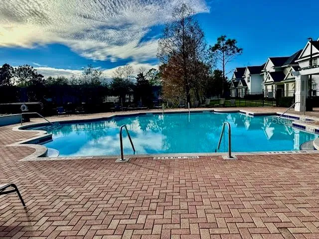 a view of a lake with a yard