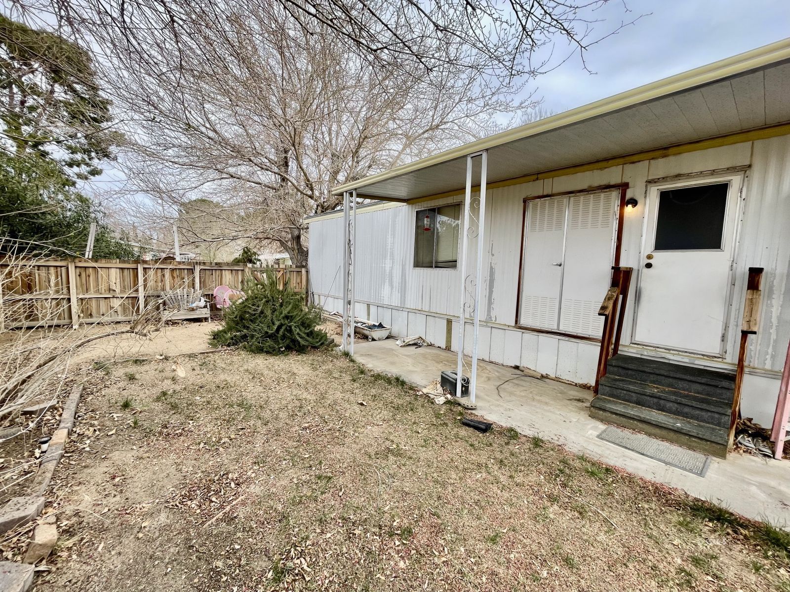 5237 Nolina Avenue Ridgecrest, CA 93555 - Photo 22 of 27 a backyard of a house