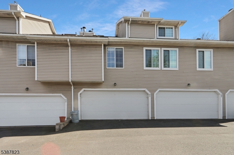 93 Birchwood Road Bedminster, NJ 07921 - Photo 3 of 18 a view of a house with a parking space