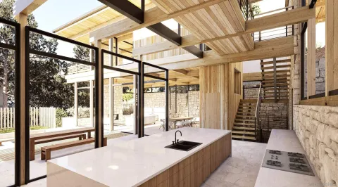 a kitchen with stainless steel appliances kitchen island granite countertop a sink and a refrigerator